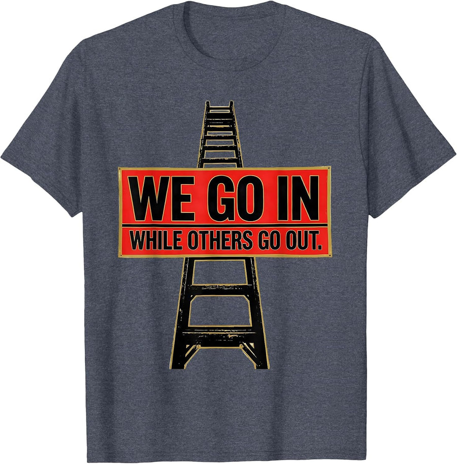 We Go In While Others Go Out Funny Firefighter Humor T-Shirt - Heather Blue